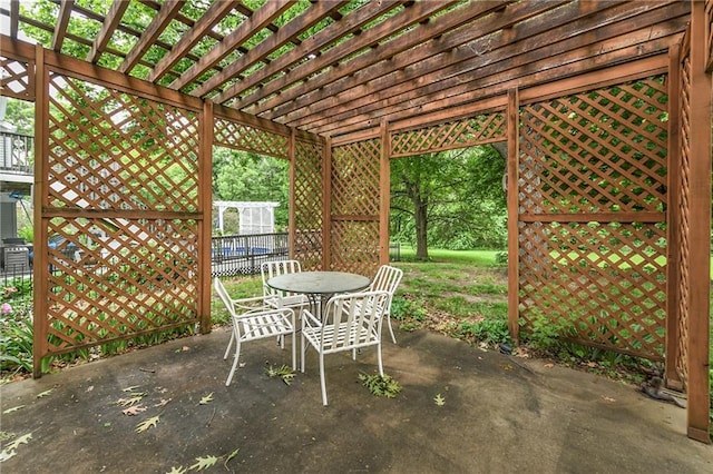 10432 Bond St, Overland Park, KS 66214 - view of patio / terrace featuring a pergola and outdoor dining space