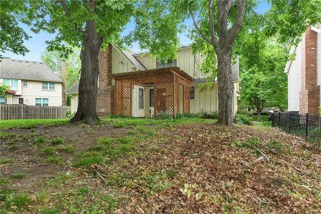 10432 Bond St, Overland Park, KS 66214 - back of property featuring board and batten siding and brick siding