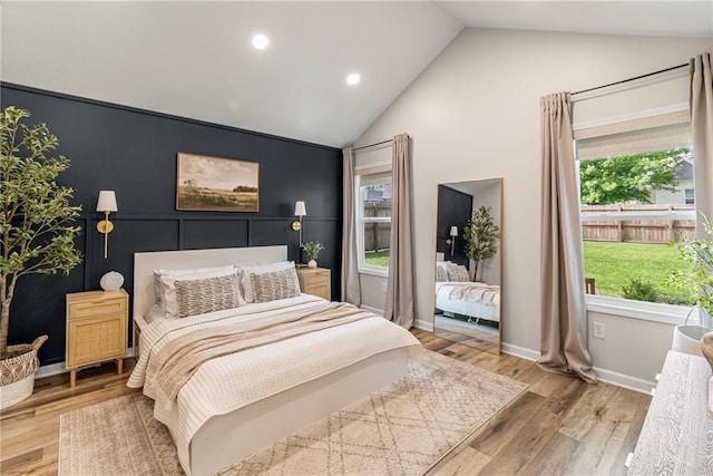 521 E Bird St, Hamilton, MO 64644 - bedroom with vaulted ceiling, light wood-style flooring, and recessed lighting