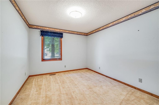 705 Ozark Short Line, Odessa, MO 64076 - unfurnished room featuring a textured ceiling and carpet
