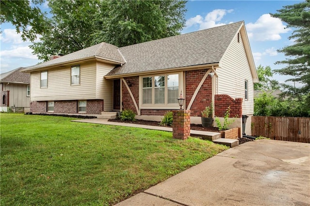 1004 SW Twilight Ln, Blue Springs, MO 64015 - view of front of home featuring brick siding and roof with shingles