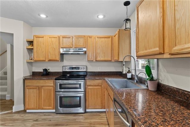 1004 SW Twilight Ln, Blue Springs, MO 64015 - kitchen with double oven range, under cabinet range hood, dishwasher, light wood-style floors, and open shelves