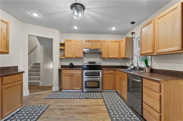 1004 SW Twilight Ln, Blue Springs, MO 64015 - kitchen featuring appliances with stainless steel finishes, under cabinet range hood, open shelves, dark countertops, and a textured ceiling