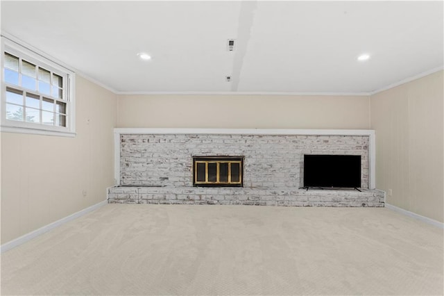 1004 SW Twilight Ln, Blue Springs, MO 64015 - unfurnished living room with a brick fireplace, carpet, ornamental molding, and recessed lighting