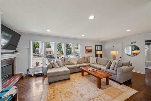 4717 W 76th St, Prairie Village, KS 66208 - living area featuring wood finished floors, a fireplace, and recessed lighting