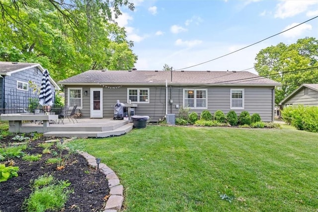 4717 W 76th St, Prairie Village, KS 66208 - back of house with a wooden deck and a yard