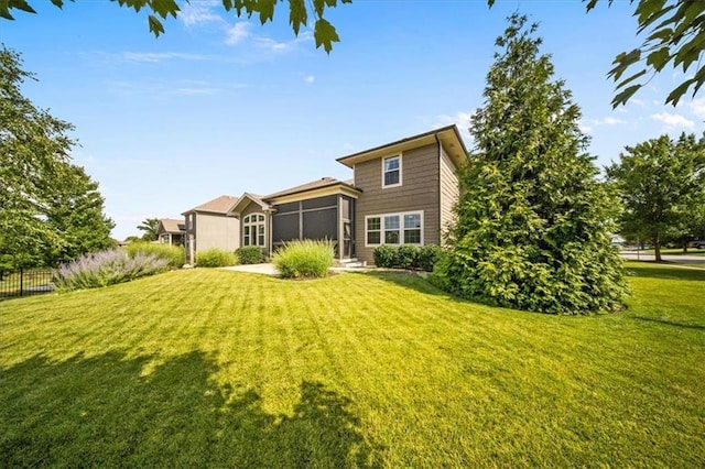 9158 W 178th Ter, Overland Park, KS 66013 - back of property with a sunroom