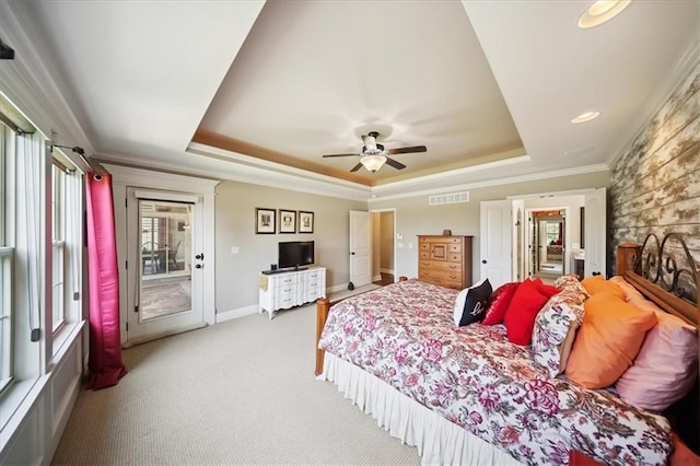 9158 W 178th Ter, Overland Park, KS 66013 - bedroom with a tray ceiling, access to outside, light colored carpet, crown molding, and ceiling fan