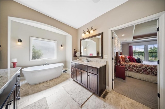 9158 W 178th Ter, Overland Park, KS 66013 - ensuite bathroom with vanity and a freestanding bath