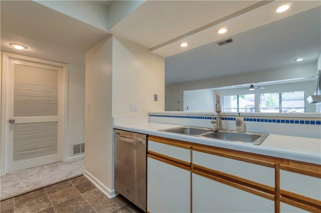 8858 W 106th Ter, Overland Park, KS 66212 - kitchen with dishwasher, light countertops, dark stone finish flooring, ceiling fan, and recessed lighting