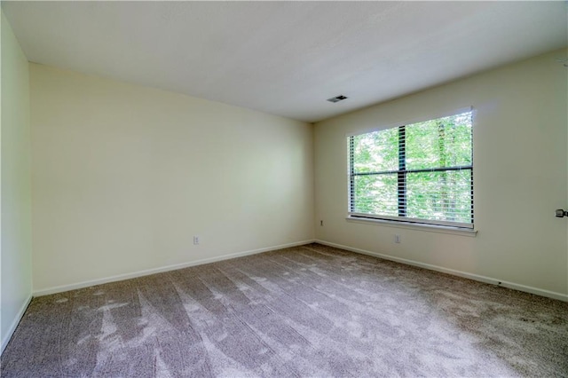8858 W 106th Ter, Overland Park, KS 66212 - carpeted spare room featuring baseboards