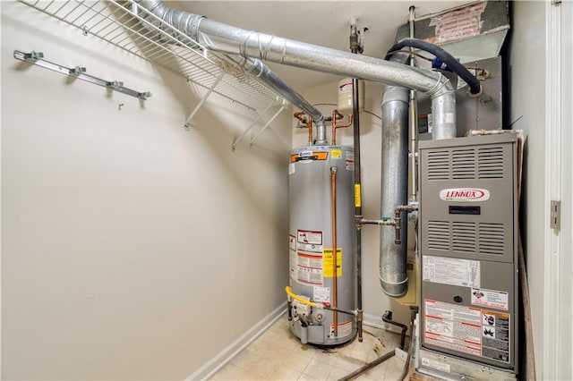 8858 W 106th Ter, Overland Park, KS 66212 - utility room featuring water heater and heating unit