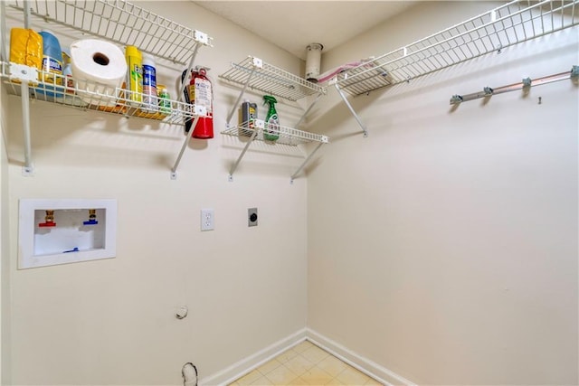 8858 W 106th Ter, Overland Park, KS 66212 - laundry area featuring hookup for a washing machine, hookup for an electric dryer, and gas dryer hookup