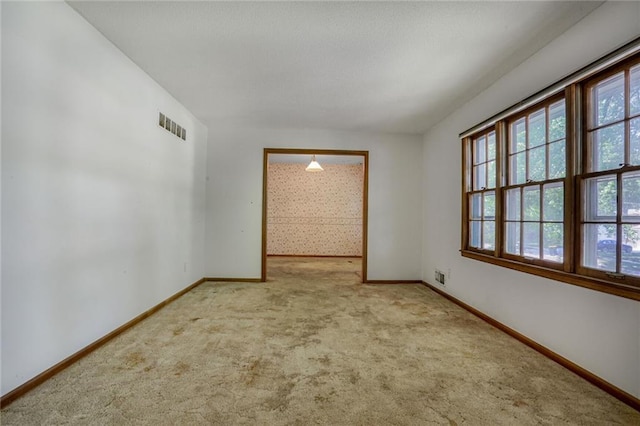 619 E 109th Ter, Kansas City, MO 64131 - unfurnished room featuring carpet floors and baseboards