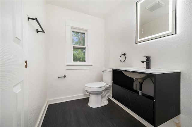 3344 Chestnut Ave, Kansas City, MO 64128 - half bath with wood finished floors and baseboards