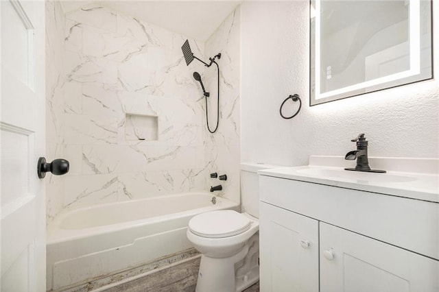 3344 Chestnut Ave, Kansas City, MO 64128 - bathroom featuring vanity, bathing tub / shower combination, and a textured wall