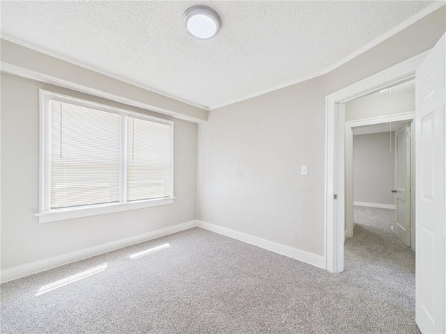 3904 Bales Ave, Kansas City, MO 64130 - unfurnished room featuring carpet floors and a textured ceiling