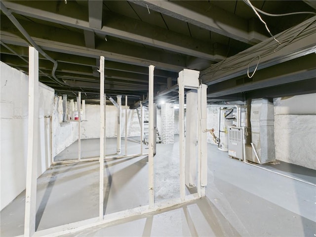 3904 Bales Ave, Kansas City, MO 64130 - unfinished below grade area with heating unit