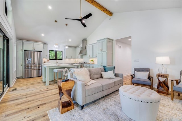 48 M St, Lake Lotawana, MO 64086 - living room with light wood-style floors, beamed ceiling, ceiling fan, high vaulted ceiling, and recessed lighting