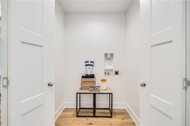 48 M St, Lake Lotawana, MO 64086 - washroom featuring hookup for an electric dryer, light wood finished floors, and washer hookup