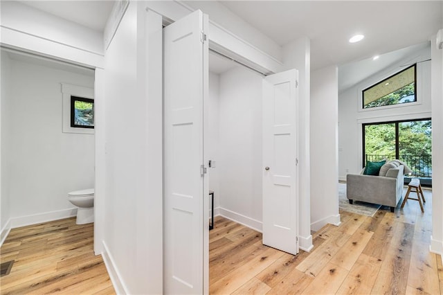 48 M St, Lake Lotawana, MO 64086 - hall featuring light wood-style floors and recessed lighting
