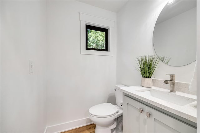 48 M St, Lake Lotawana, MO 64086 - bathroom with vanity and wood finished floors