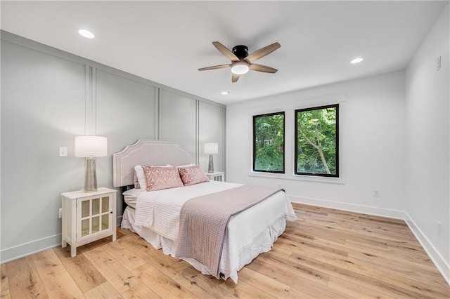 48 M St, Lake Lotawana, MO 64086 - bedroom with light wood-style flooring, recessed lighting, and ceiling fan