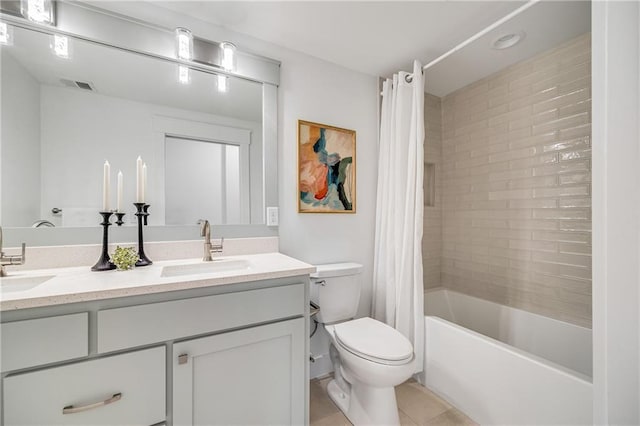 48 M St, Lake Lotawana, MO 64086 - full bath with double vanity, shower / bath combo with shower curtain, and tile patterned flooring