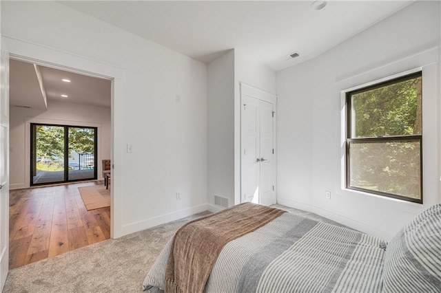 48 M St, Lake Lotawana, MO 64086 - bedroom featuring carpet floors and recessed lighting