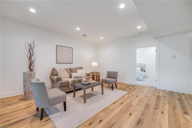 48 M St, Lake Lotawana, MO 64086 - living room featuring light wood-style floors and recessed lighting