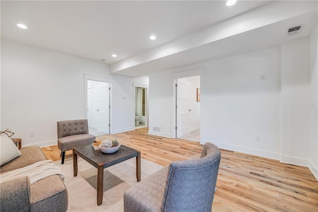 48 M St, Lake Lotawana, MO 64086 - living area featuring light wood-style floors and recessed lighting