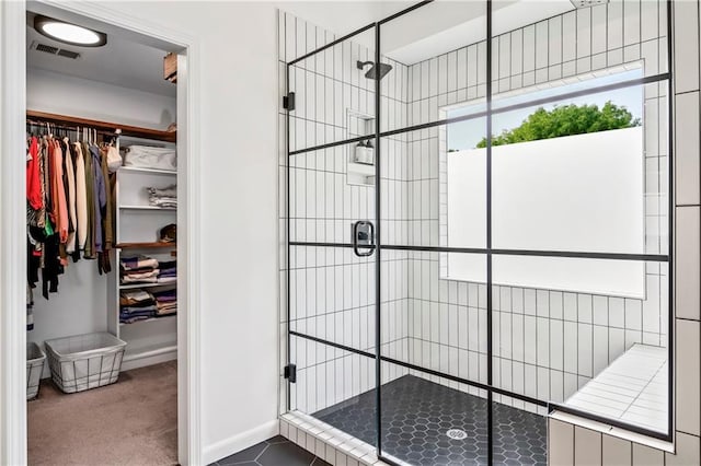 11245 S Penrose St, Olathe, KS 66061 - bathroom with a shower stall and a spacious closet