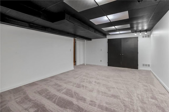 11245 S Penrose St, Olathe, KS 66061 - finished below grade area featuring carpet and baseboards