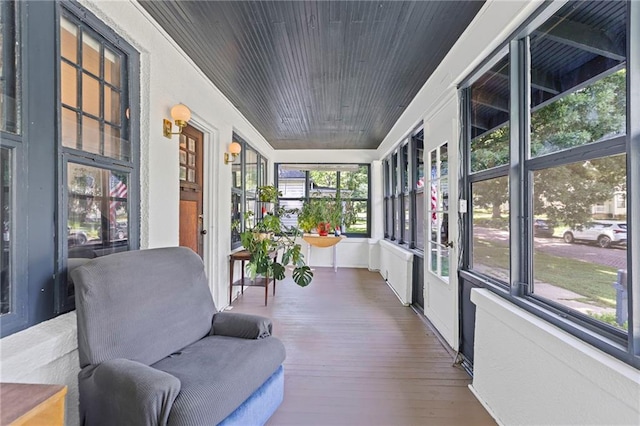 309 E Miami St, Paola, KS 66071 - sunroom / solarium with wood finished floors and wood ceiling