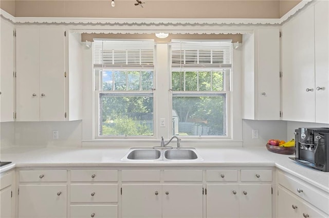 309 E Miami St, Paola, KS 66071 - kitchen with white cabinets and light countertops