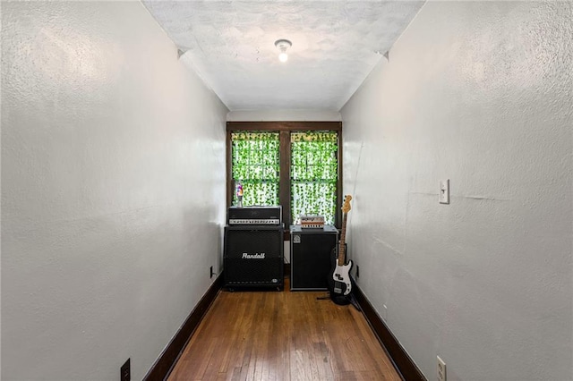 309 E Miami St, Paola, KS 66071 - entryway with dark wood finished floors and baseboards