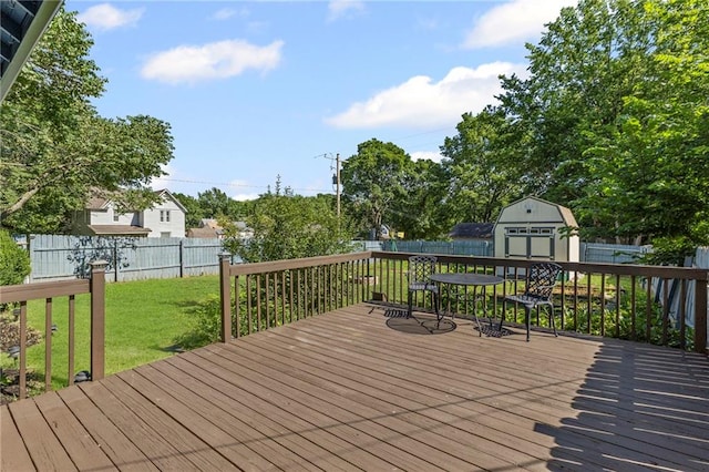 309 E Miami St, Paola, KS 66071 - wooden terrace featuring a storage shed and a fenced backyard