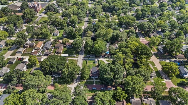 309 E Miami St, Paola, KS 66071 - view of property location featuring nearby suburban area and a tree filled landscape