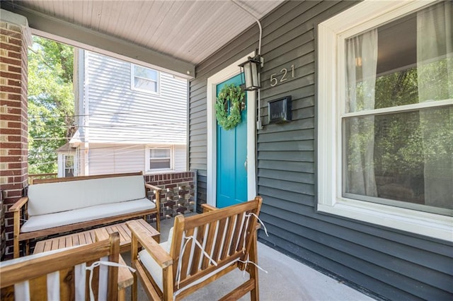 521 Tracy Ave, Kansas City, MO 64016 - doorway to property with a porch