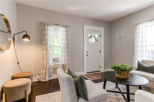 521 Tracy Ave, Kansas City, MO 64016 - living area featuring wood finished floors and baseboards