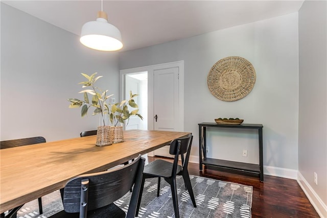 521 Tracy Ave, Kansas City, MO 64016 - dining space with wood finished floors and baseboards