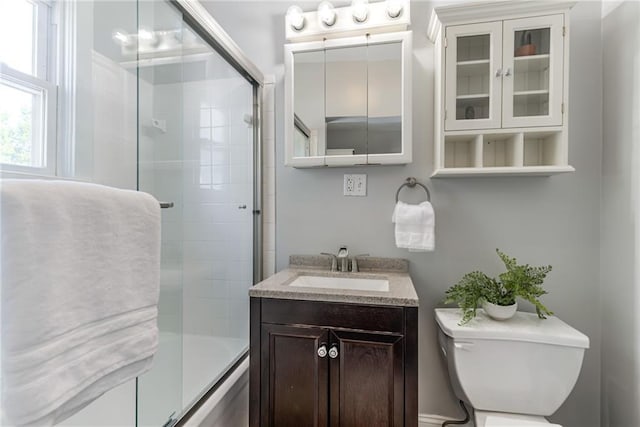 521 Tracy Ave, Kansas City, MO 64016 - full bath with vanity and shower / bath combination with glass door