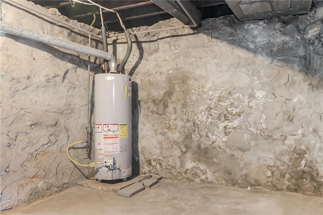521 Tracy Ave, Kansas City, MO 64016 - unfinished below grade area with gas water heater
