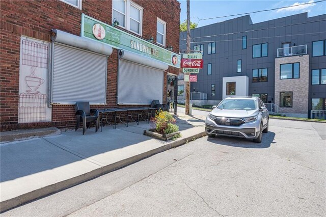 521 Tracy Ave, Kansas City, MO 64016 - view of property featuring uncovered parking