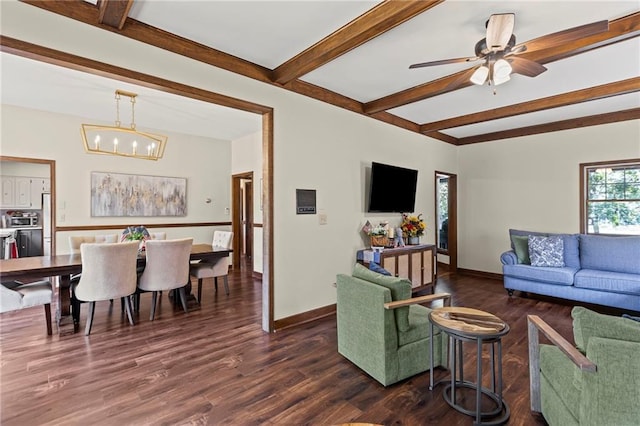 1124 S Locust St, Ottawa, KS 66067 - living room featuring beam ceiling, dark wood-style floors, ceiling fan, and a chandelier