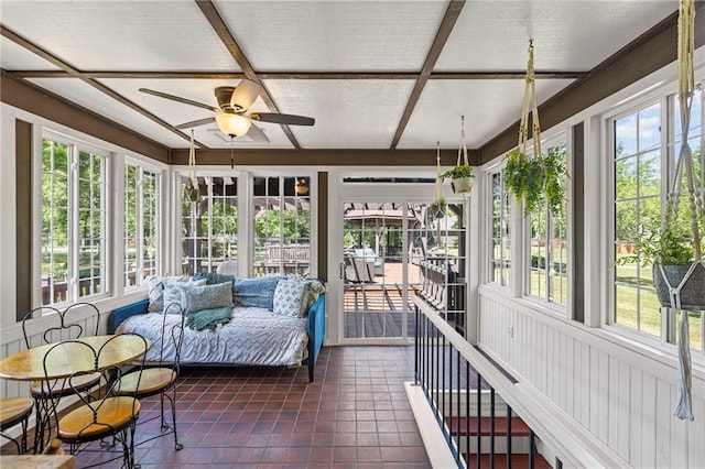 1124 S Locust St, Ottawa, KS 66067 - sunroom featuring a ceiling fan and plenty of natural light