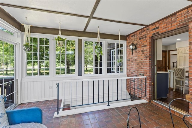 1124 S Locust St, Ottawa, KS 66067 - unfurnished sunroom with tile patterned floors