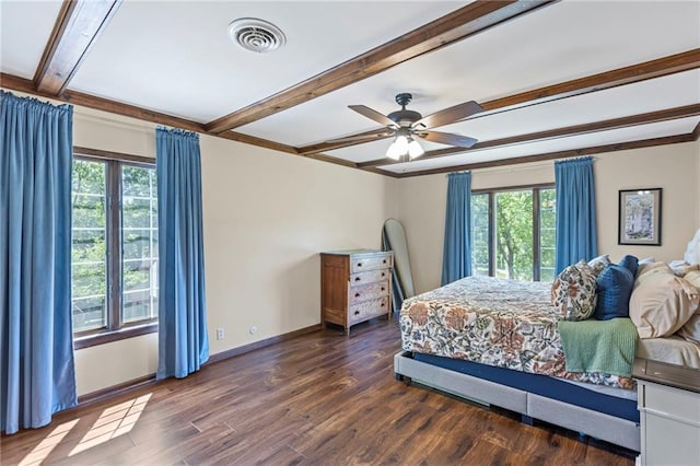 1124 S Locust St, Ottawa, KS 66067 - bedroom featuring multiple windows, beam ceiling, dark wood-style flooring, and a ceiling fan