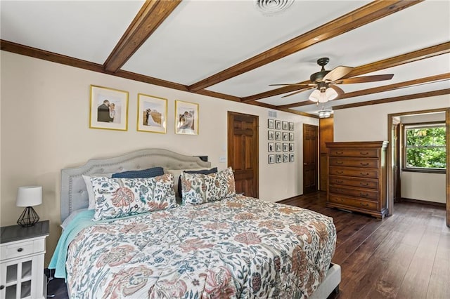 1124 S Locust St, Ottawa, KS 66067 - bedroom featuring beamed ceiling, dark wood-style floors, and ceiling fan