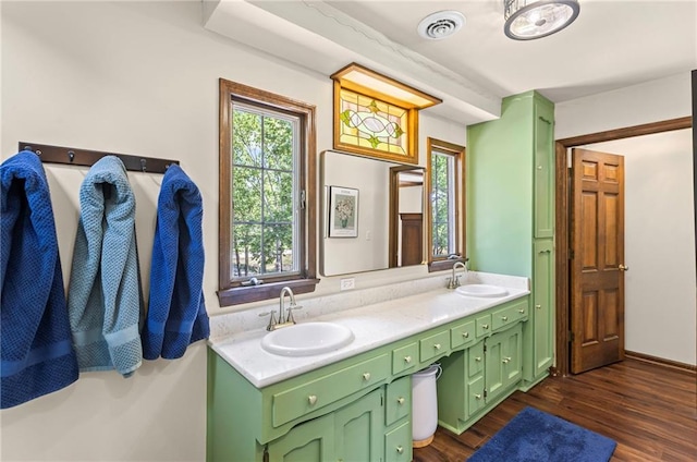 1124 S Locust St, Ottawa, KS 66067 - full bath featuring double vanity and wood finished floors